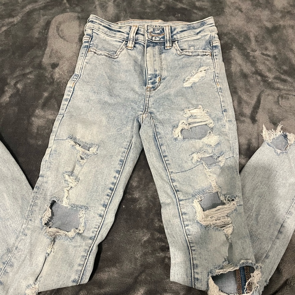 light wash high rise ripped jeans